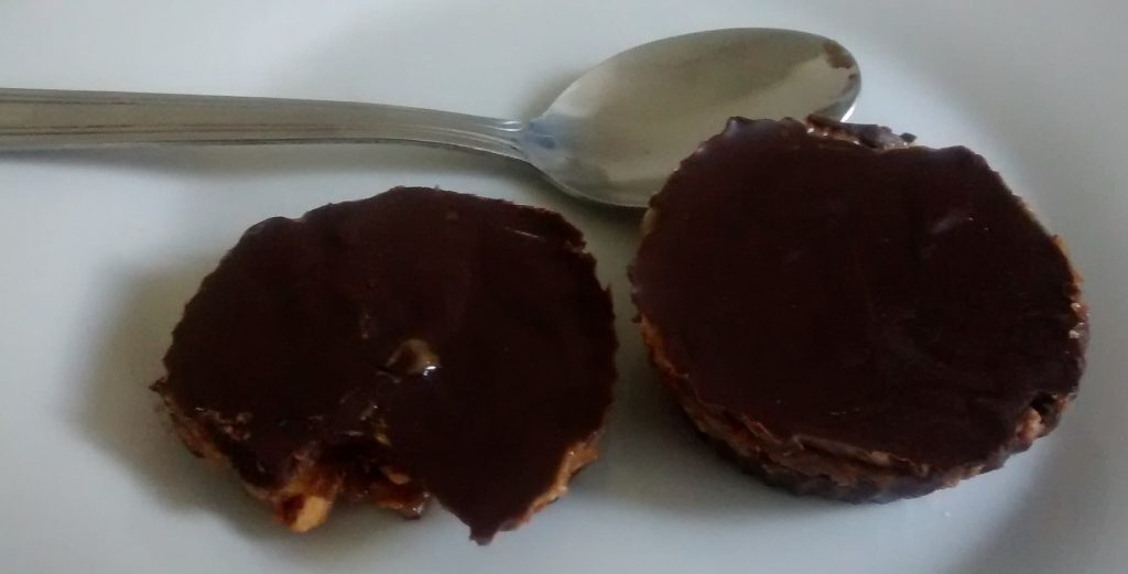 almond butter cups with teaspoon
